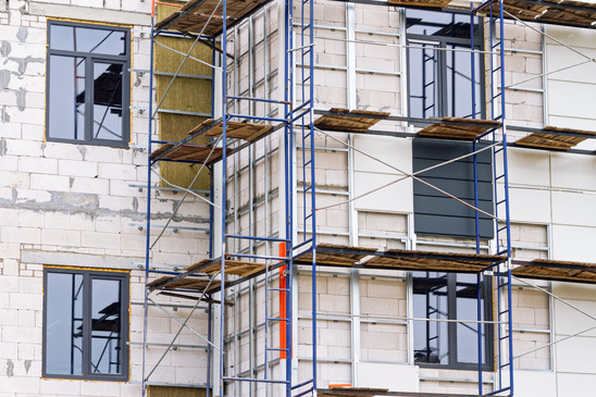 Building under construction with scaffolding